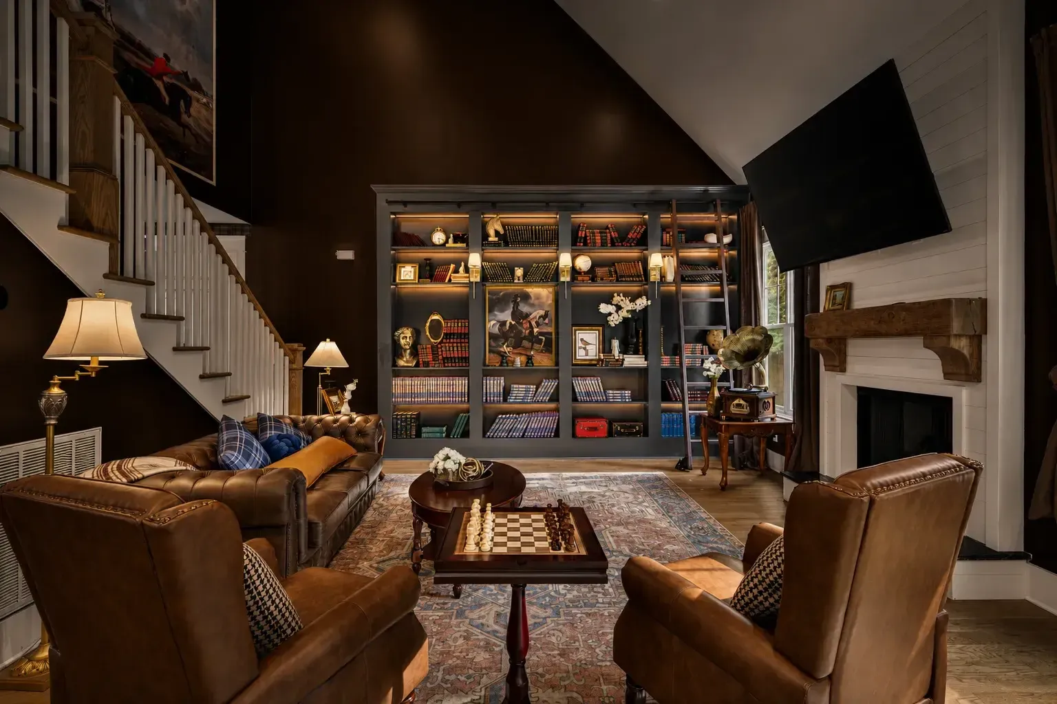 Living room with built-in bookshelves and leather seating